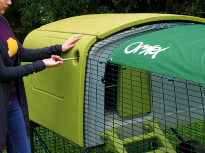 Image of the Eglu Cube's door being opened.