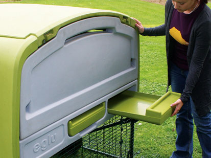 Image of Eglu Cube's dropping trays being removed