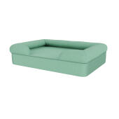 Ein nackenrollen-hundebett in blaugrün.