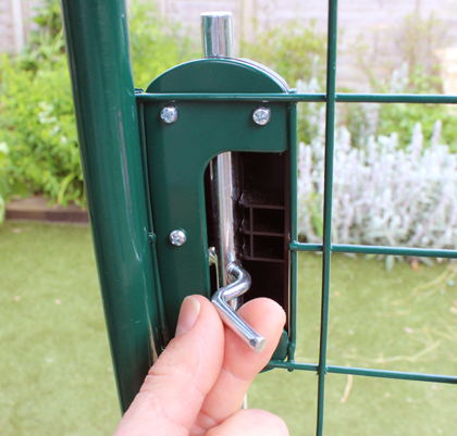 You can lock and unlock the door from inside the Outdoor Rabbit Run.